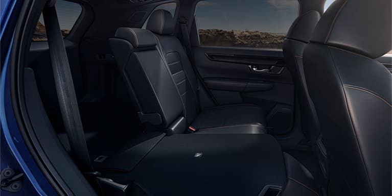 2027 Honda CR-V showing the 60/40 split rear seatback folded down for cargo (Compact Crossover SUV).